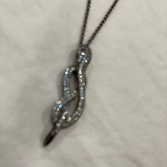 Snake necklace with faux diamonds red eyes making a figure 8 shape dark silver - Picture 7 of 7
